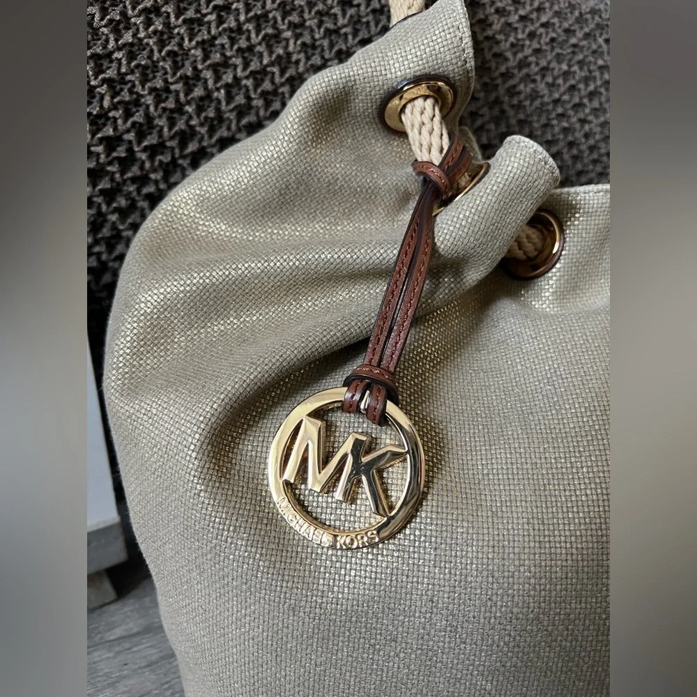 Michael Kors Marina Gathered Drawstring Gold Metallic Shimmer Hobo Shoulder Bag.